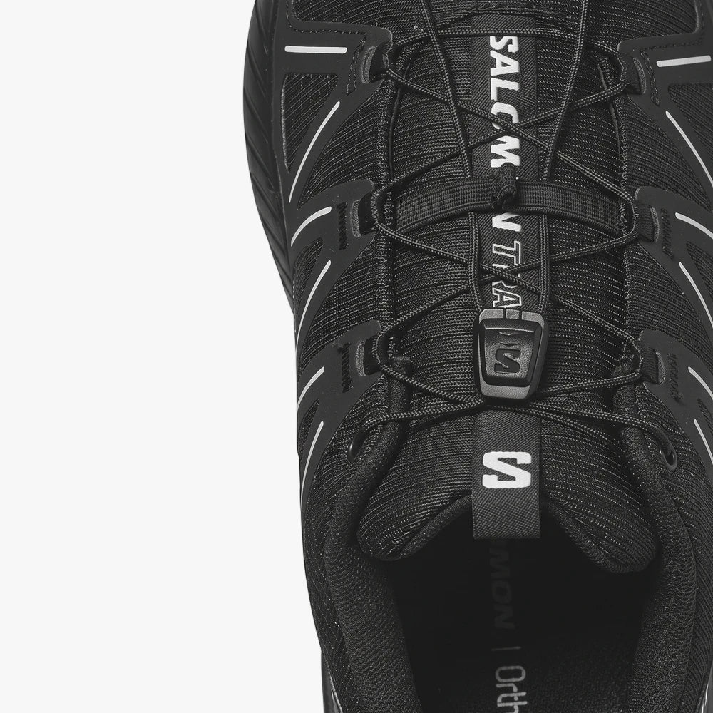 Close-up of a black Salomon Mens Speedcross Peak Trail Sneaker showing the lacing system and mesh upper.