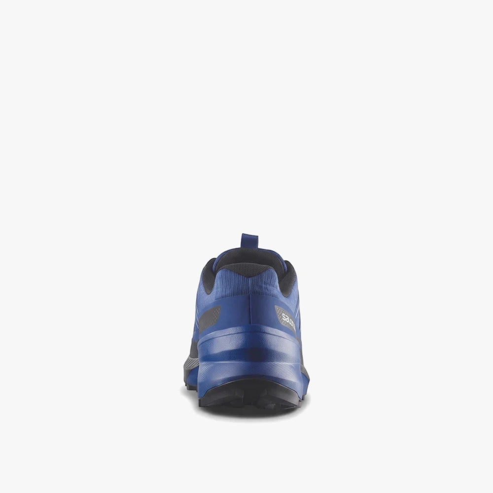 Salomon Mens Speedcross Peak Trail Sneaker in lapis blue, black, and white, shown from the back view.