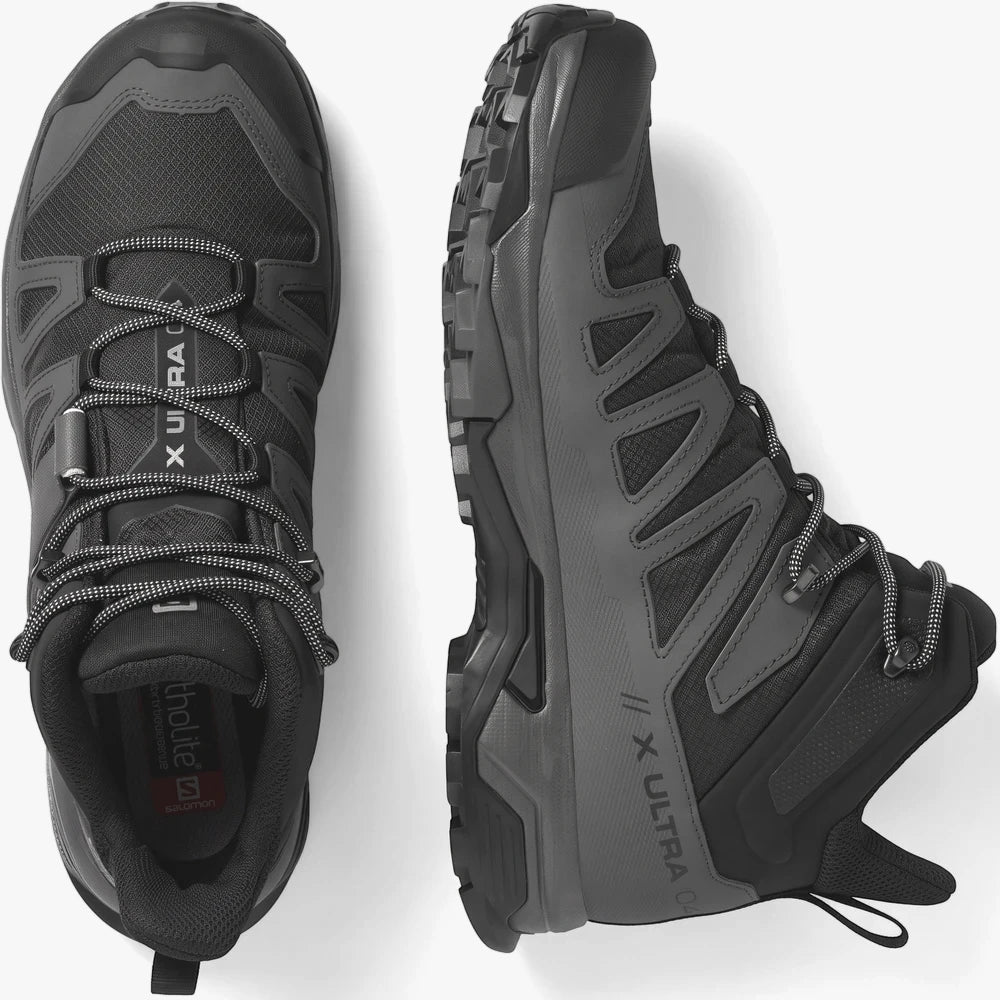 Two Salomon Mens X Ultra 4 Mid GTX sneakers in black and magnet grey, shown from top and side views, on a light background.
