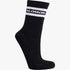 Salomon Sporty Crew Sock in black, featuring white striped accents and the Salomon logo near the cuff.