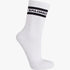 White Salomon Sporty Crew Sock featuring black stripes and a logo on the ribbed cuff, viewed from a side angle.