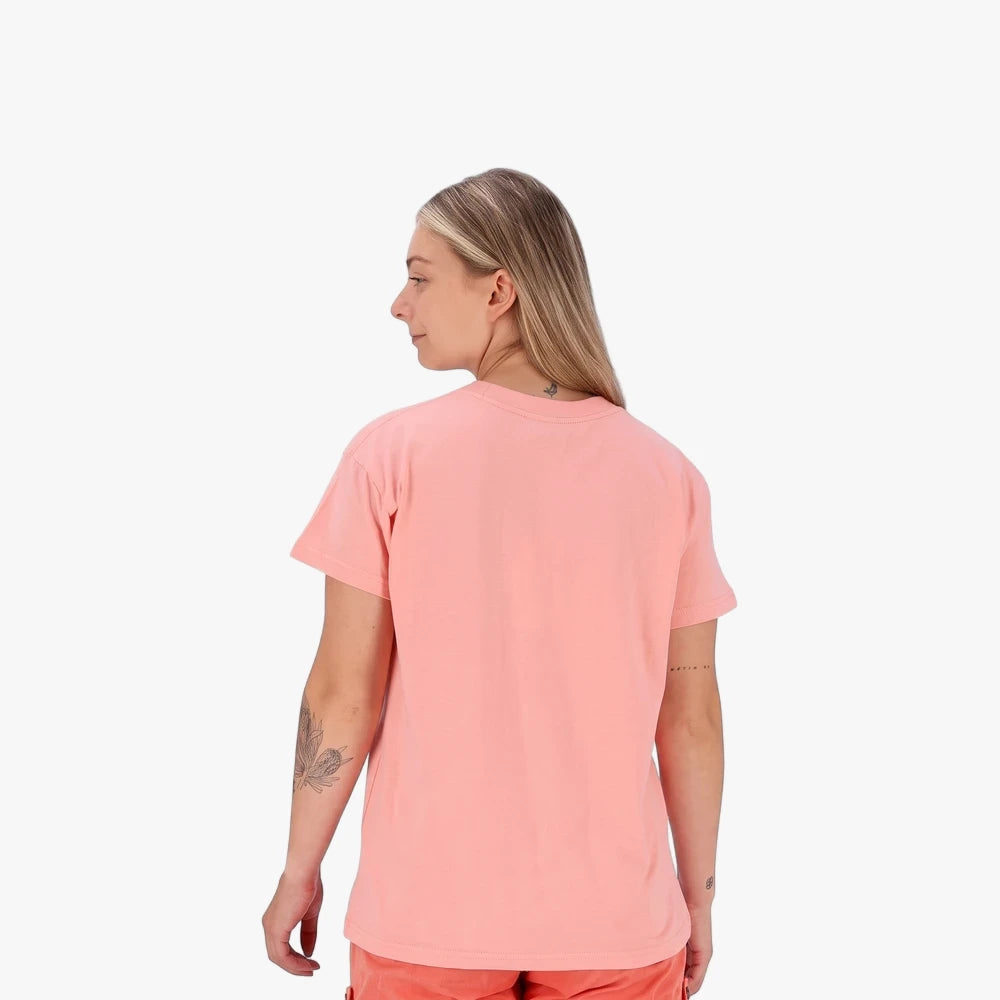Salomon Womens Freedom Short Sleeve Tee in murex shell color, worn by a woman from the back-right view.