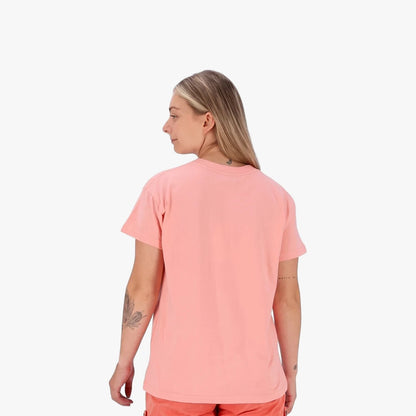 Salomon Womens Freedom Short Sleeve Tee in murex shell color, worn by a woman from the back-right view.