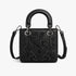 Black Sissy Boy Emma handbag with ornate floral embroidery, studded details, a top handle, and detachable shoulder strap.