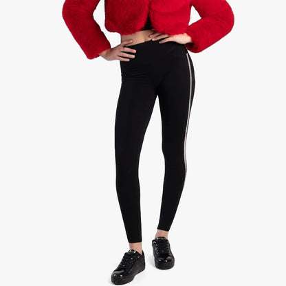Model wearing Sissy Boy Joey Sculpt Knit Jegging with a dazzling side diamante tape in black, paired with a red cropped