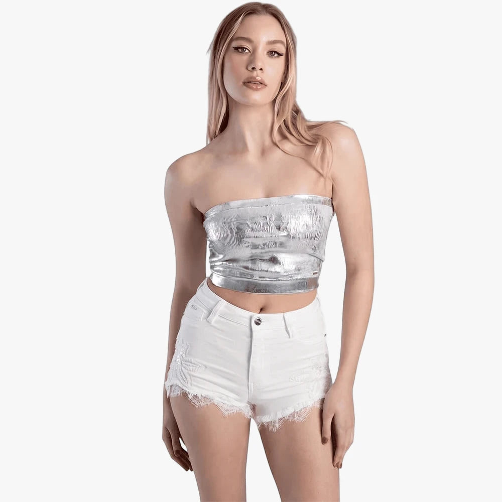Sissy Boy Womens Metallic Silver Bandeau top and white distressed denim shorts, modeled on a blonde woman.