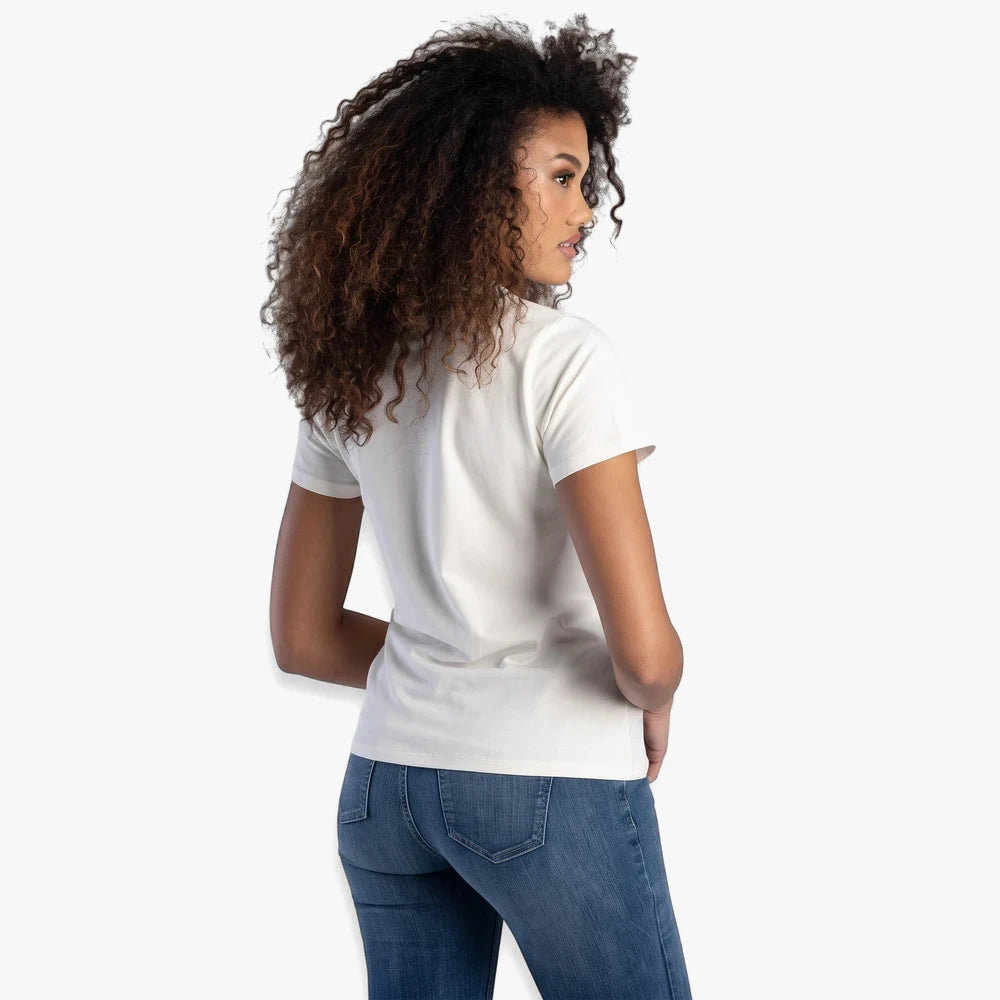 Off-white Sissy Boy Womens Pearl Abd Bling Top, a short-sleeve t-shirt, shown from the back on a model. Worn with blue jeans.