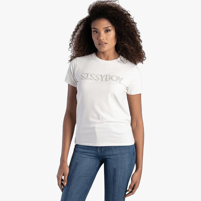 Woman models Sissy Boy Off White Pearl Bling Top and blue jeans on a studio backdrop.