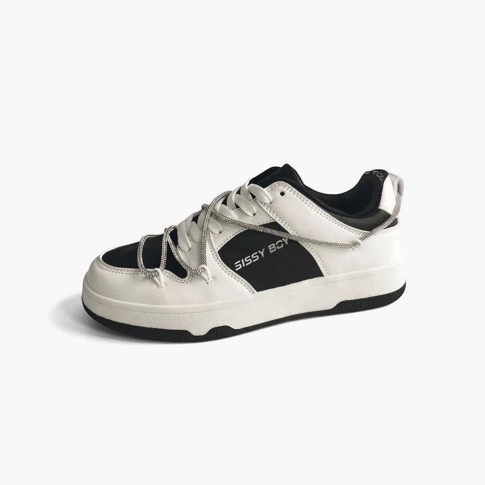 Sissy Boy Womens Reverse Colourblock Sneaker Diamante Trip in white and black, shown angled with silver lace trim.
