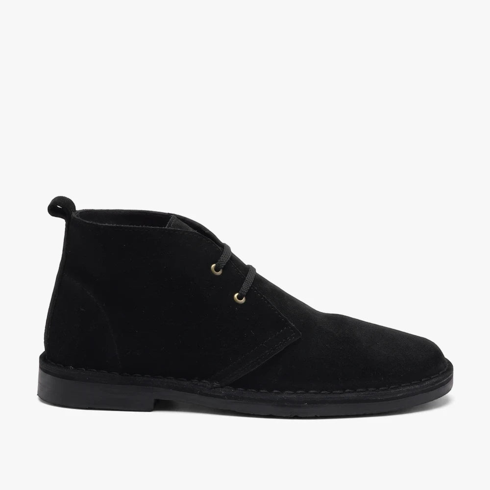 Black suede Survivor Hunter Vellies Boots, shown from a side view, featuring a classic design with two eyelets.