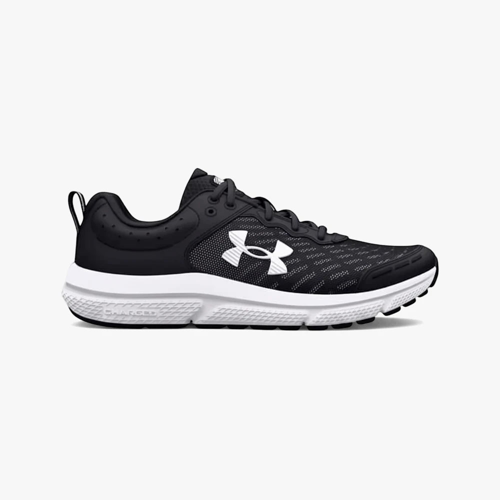 Black Under Armour Bgs Assert Sneaker 001 with a white sole, viewed from the side, ideal for running and athletic activities.