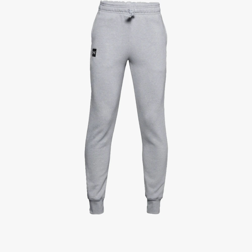 Light grey Under Armour Boys Rival Fleece Joggers, detailed with a visible drawstring waistband and ribbed ankle cuffs.