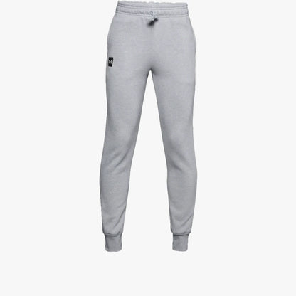 Light grey Under Armour Boys Rival Fleece Joggers, detailed with a visible drawstring waistband and ribbed ankle cuffs.
