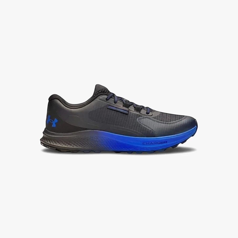 Under Armour Mens Charged Bandit Tr 3 Sneaker in black with a vibrant blue sole, shown in a detailed side profile view.