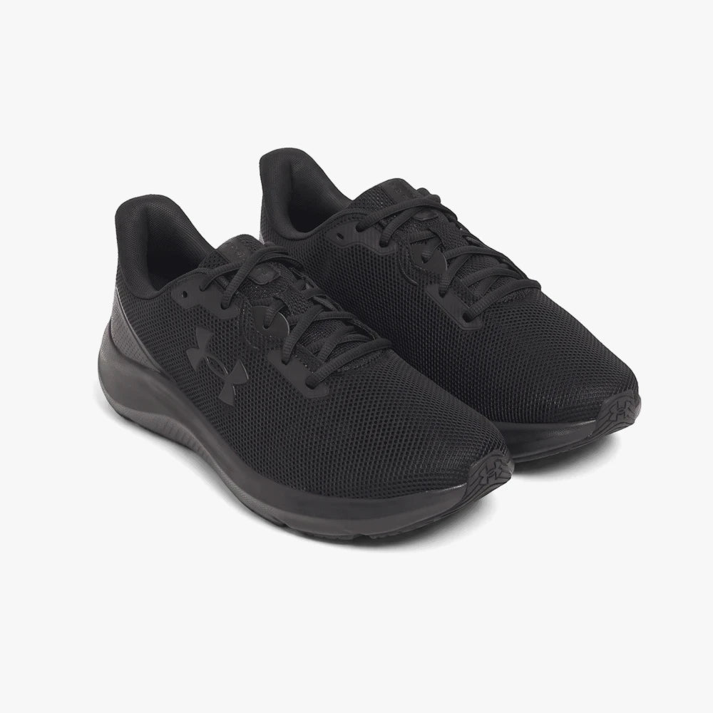 Under Armour Mens Charged Pursuit 4 sneakers in black, featuring a mesh upper and classic lace-up design, shown from an