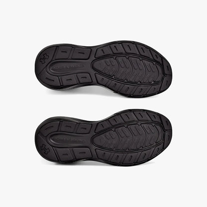 Under Armour Mens Charged Rogue 5 Sneaker Black Black. View of the black rubber soles with detailed tread patterns and logo.