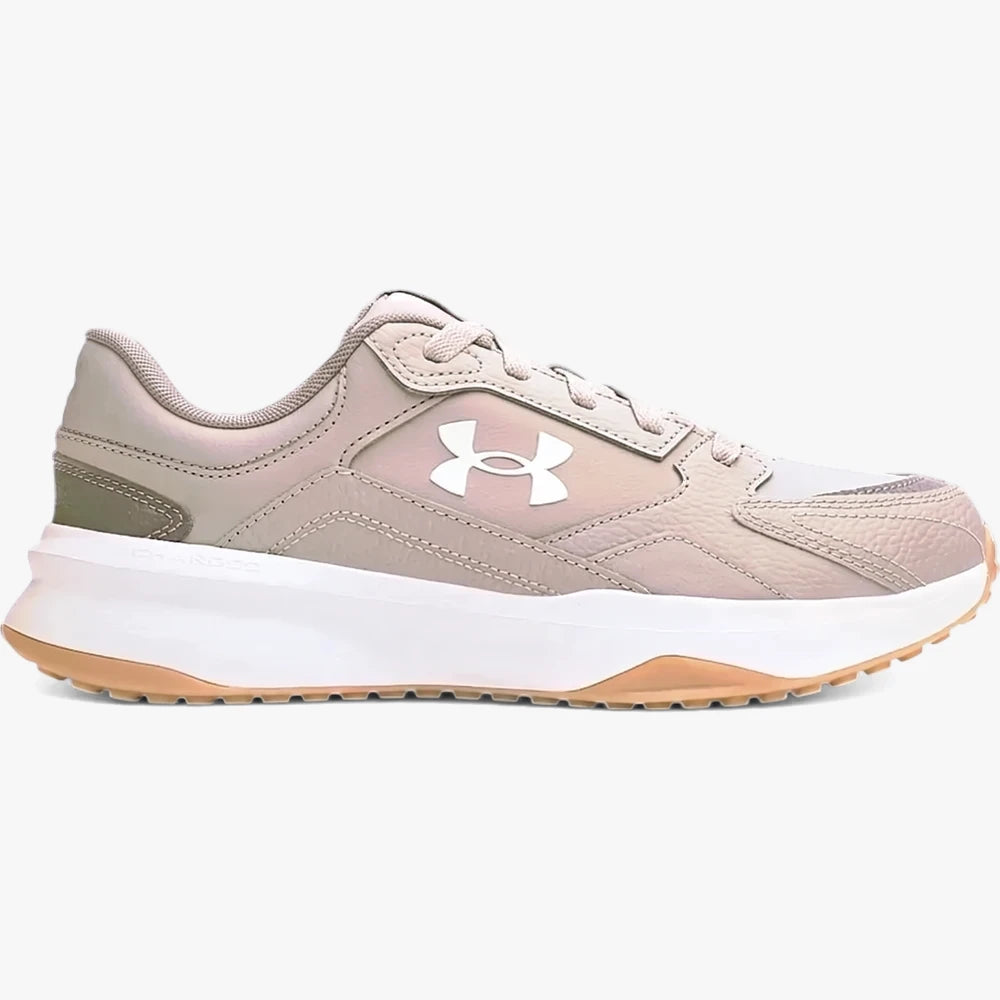 A beige Under Armour Mens Edge Leather Sneaker 203, featuring a white midsole and brown outsole, presented in a side view.