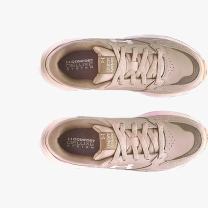 Two Under Armour Mens Edge Leather Sneakers in beige, viewed from directly above.