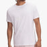 White short sleeve t-shirt for men, made of soft cotton, with a subtle logo, worn by a model in a studio shot.
