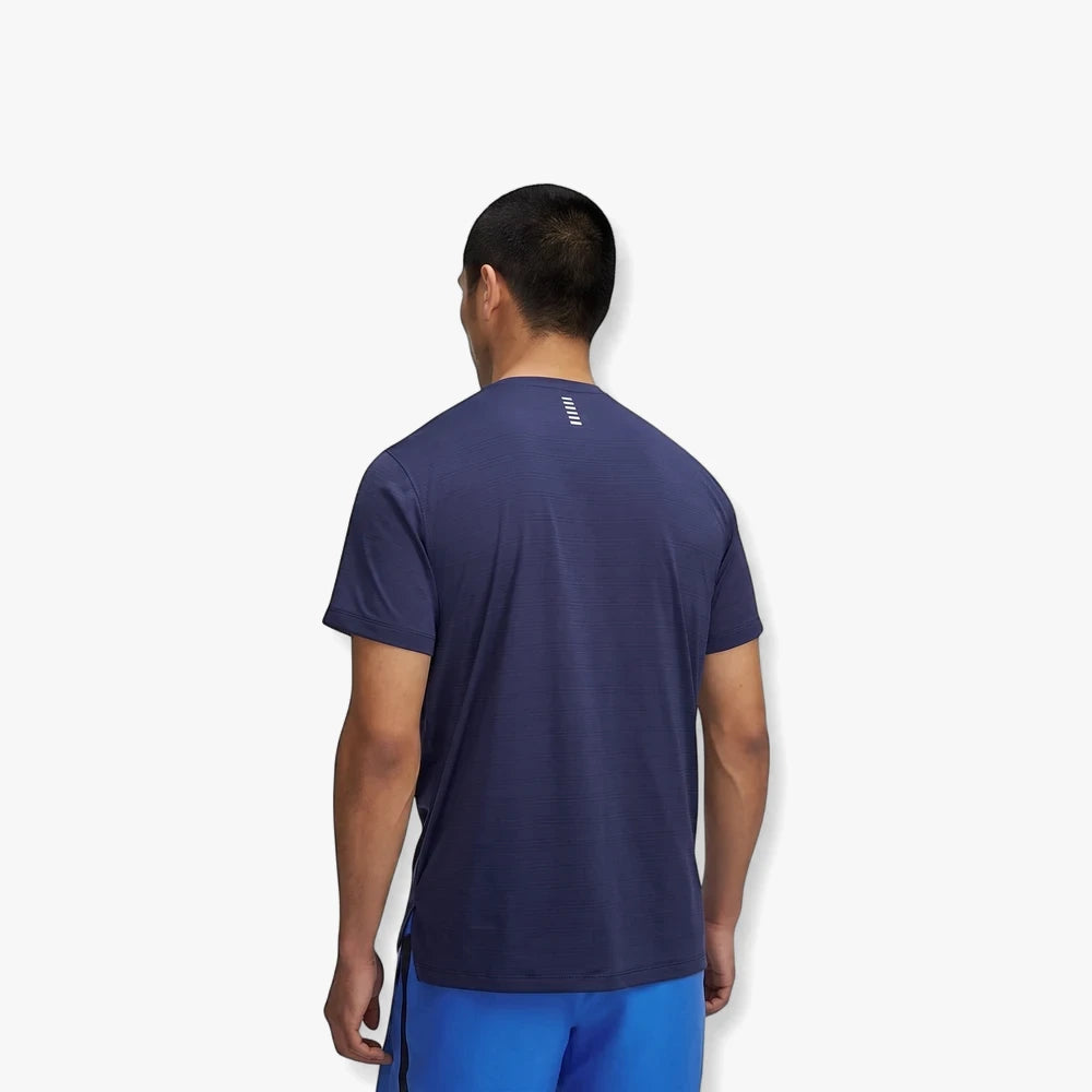 Under Armour Mens Launch Short Sleeve Tee Washed Navy, featuring the back view of a man wearing the navy t-shirt.