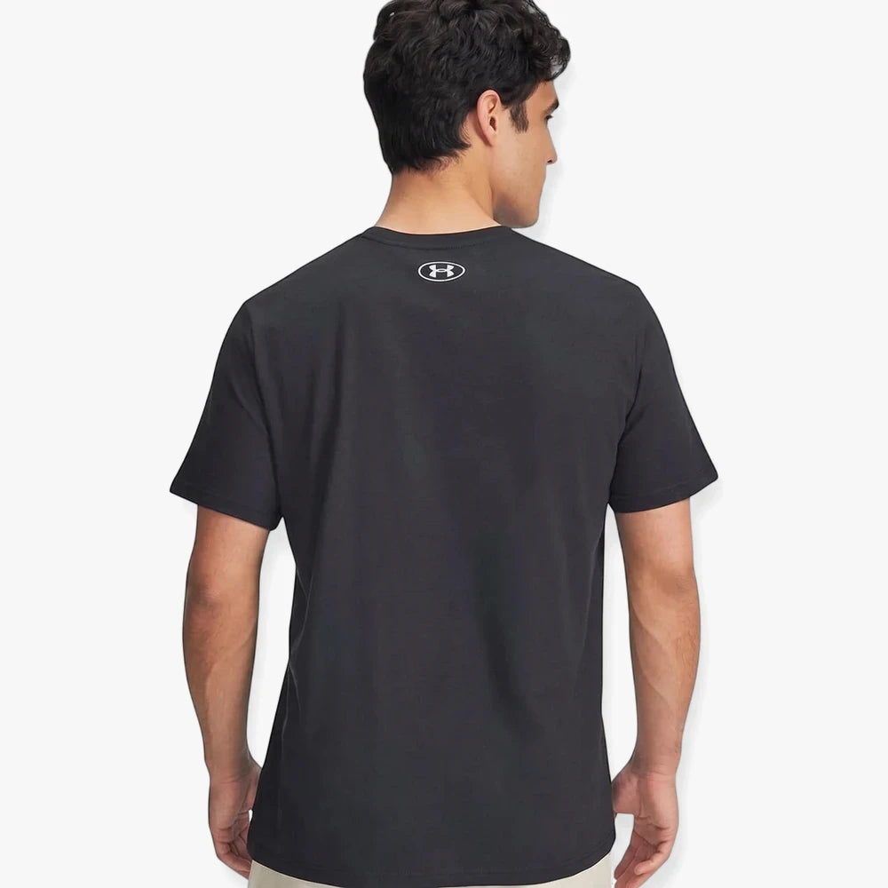 Back view of a man wearing a black Under Armour men&