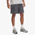 Under Armour Mens Vibe Woven Cargo Shorts in Castlerock grey worn by a model, showing the side cargo pocket and athletic