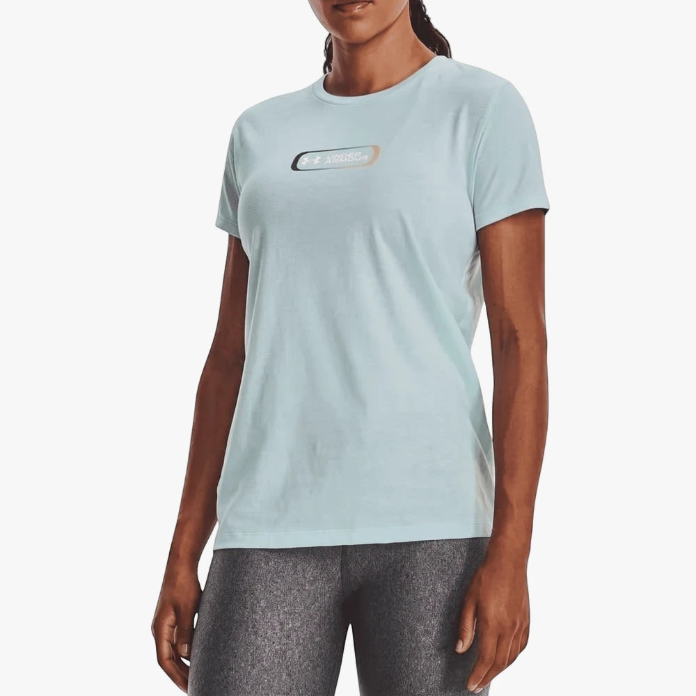 Under Armour Womens Gradient Pill Short Sleeve Tee in light blue, featuring a gradient pill logo on the chest, modeled by a