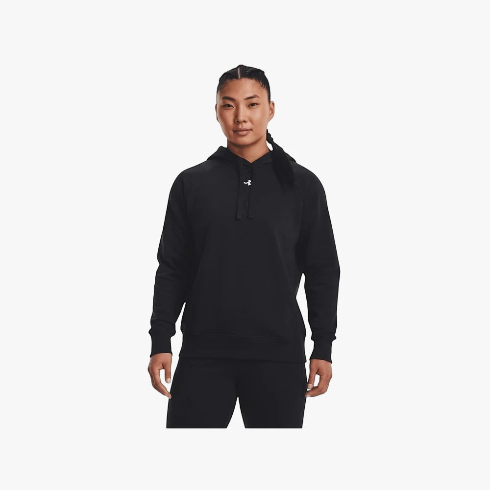 Woman wearing a black Under Armour Womens Rival Fleece Hoodie, featuring a button placket and ribbed cuffs, standing in a